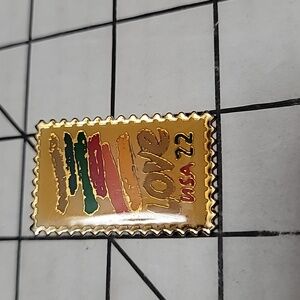 Love postage stamp pin‎